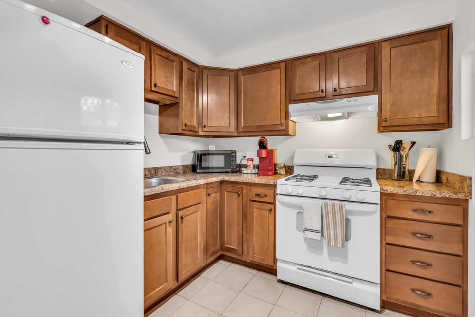 Ample counter space and sleek finishes make meal prep a breeze