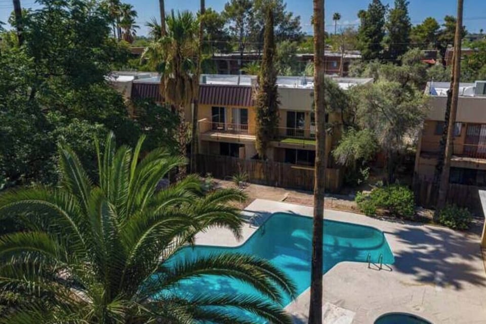 The complex pool located outside the back patio gate. This pool goes down 8ft and is maintained by the HOA