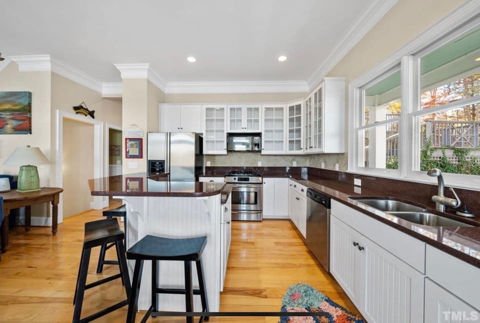 Kitchen and island with extra seating.