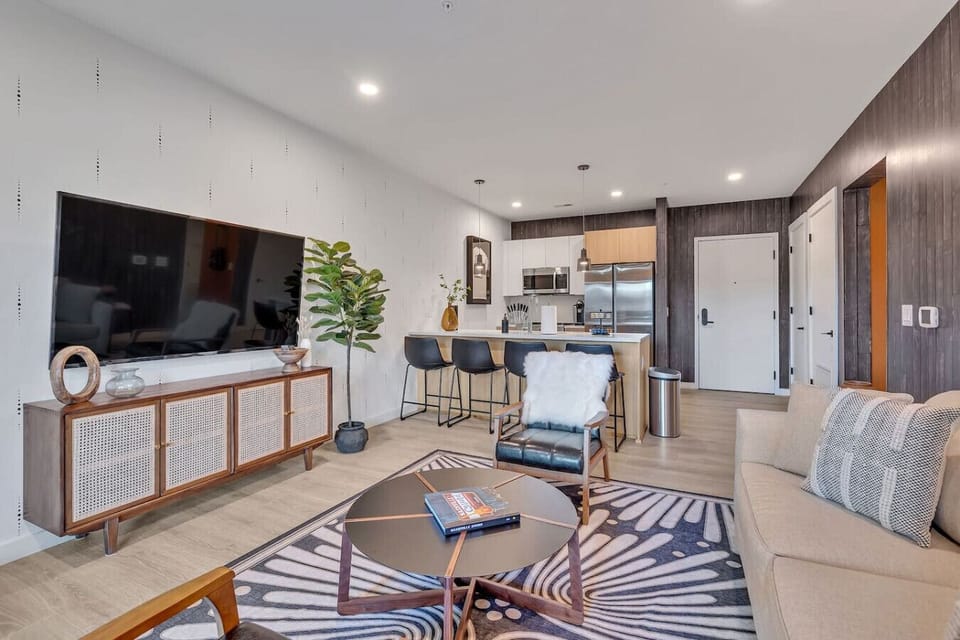 Living room with luxury furnishings and queen sleeper sofa
