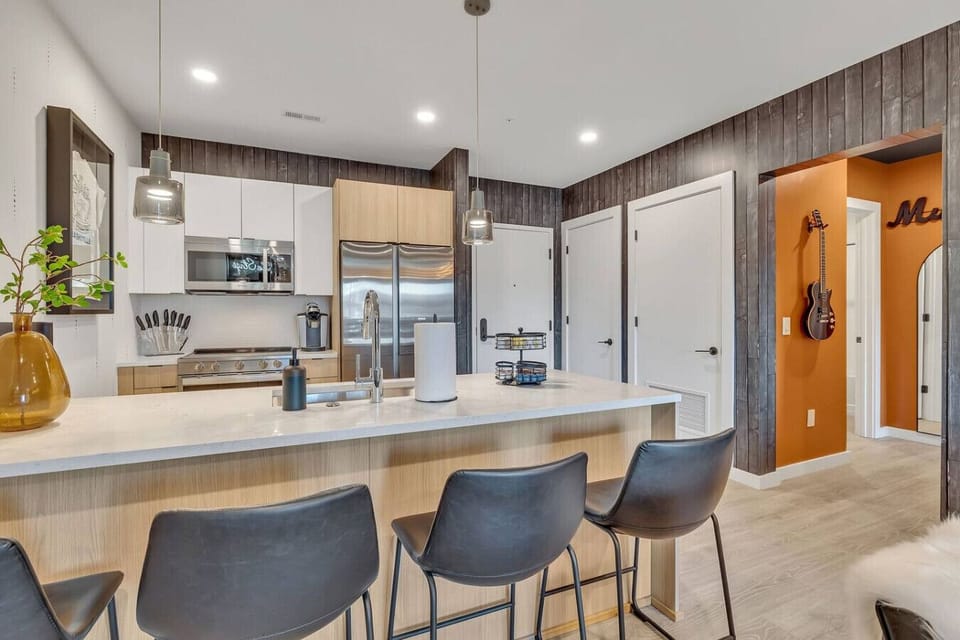 Brand new condo with stainless steel appliances, full spice rack, and all utensils needed for cooking up a meal or making a cocktail