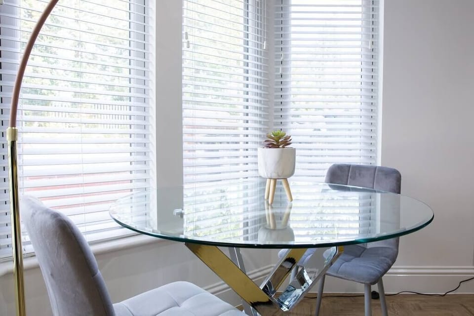 Bay window dining table for two.  Beautiful natural light.
