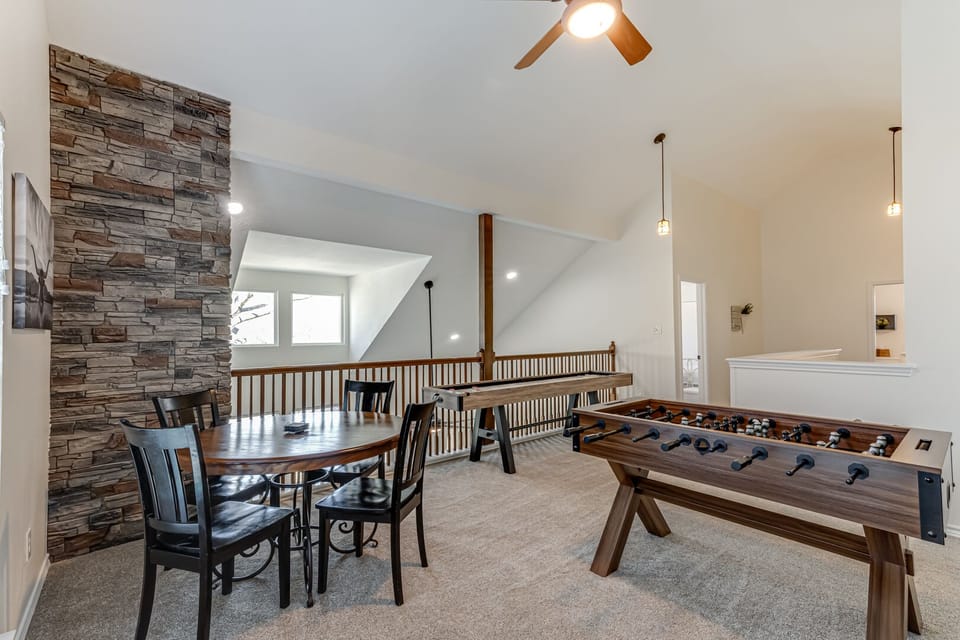 Amazing game loft with game table, foosball, shuffleboard, 70" smart TV