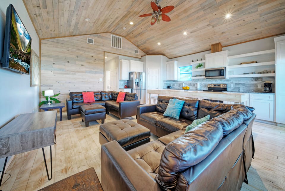 Multiple sectional sofas.