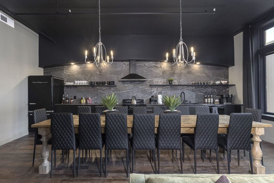Chef's kitchen with a twelve foot dining room table. Coffee and Tea bar with custom blend coffee and k-cups.