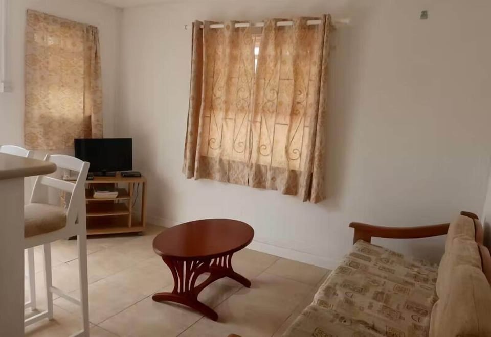 Kick back with a movie in the simple, airy lounge.