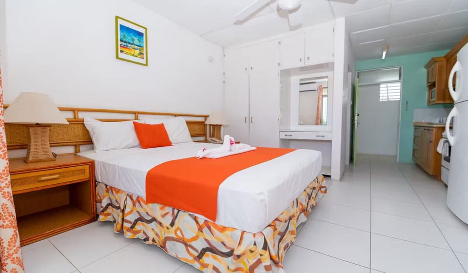 Come home to a cozy bed with convenient in-room kitchenette.