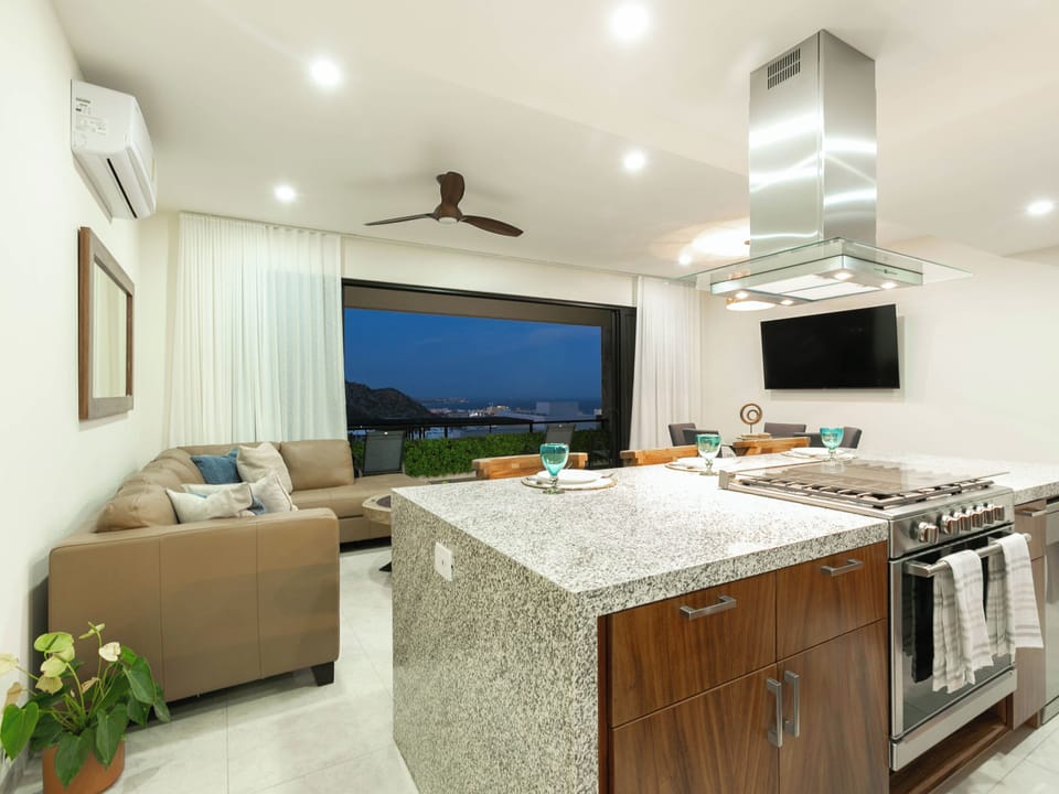 The open concept living space creates a seamless flow between the living, dining, and kitchen areas. This design maximizes natural light and fosters a welcoming atmosphere, making it perfect for both relaxing and entertaining. Enjoy the spacious, airy feel as each area effortlessly connects, offering a versatile and inviting environment.