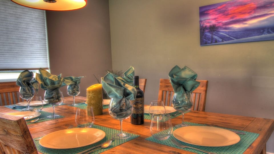 Experience a touch of rustic charm with our wooden dining room table, perfect for intimate dinners or lively gatherings.