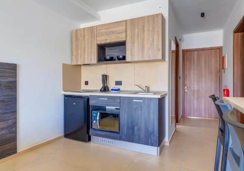 Shared kitchen for both room