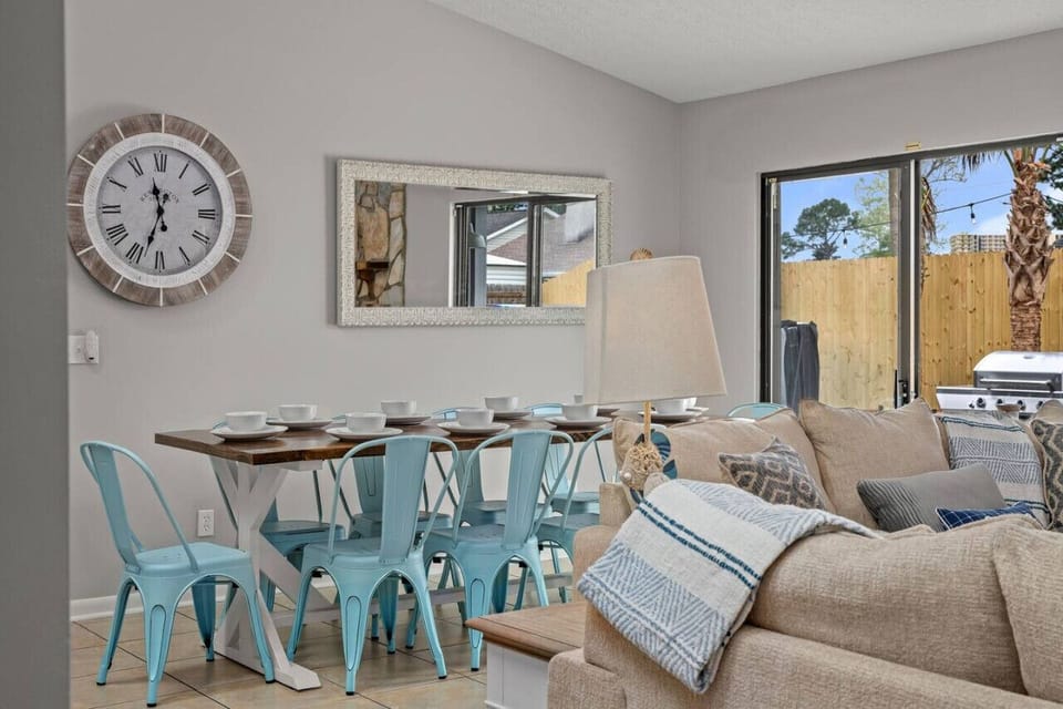 Gather around our cozy kitchen table, the heart of our home, where meals are shared, laughter echoes, and memories are made, creating a warm and inviting atmosphere for all to enjoy.
