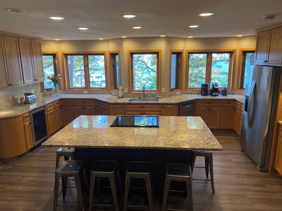 Well-stocked, Spacious, Open-concept “Gourmet/Chef’s” kitchen.