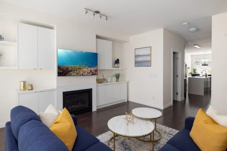 Comfortable sectional with seating for 5 and a 55" Smart TV .