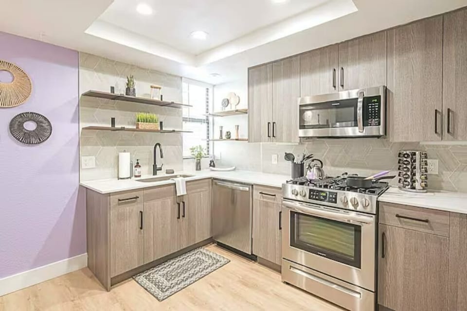 A fully equipped kitchen with modern appliances and everything you need to cook your favorite meals like you're at home.