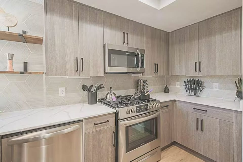 A fully equipped kitchen with modern appliances and everything you need to cook your favorite meals like you're at home.