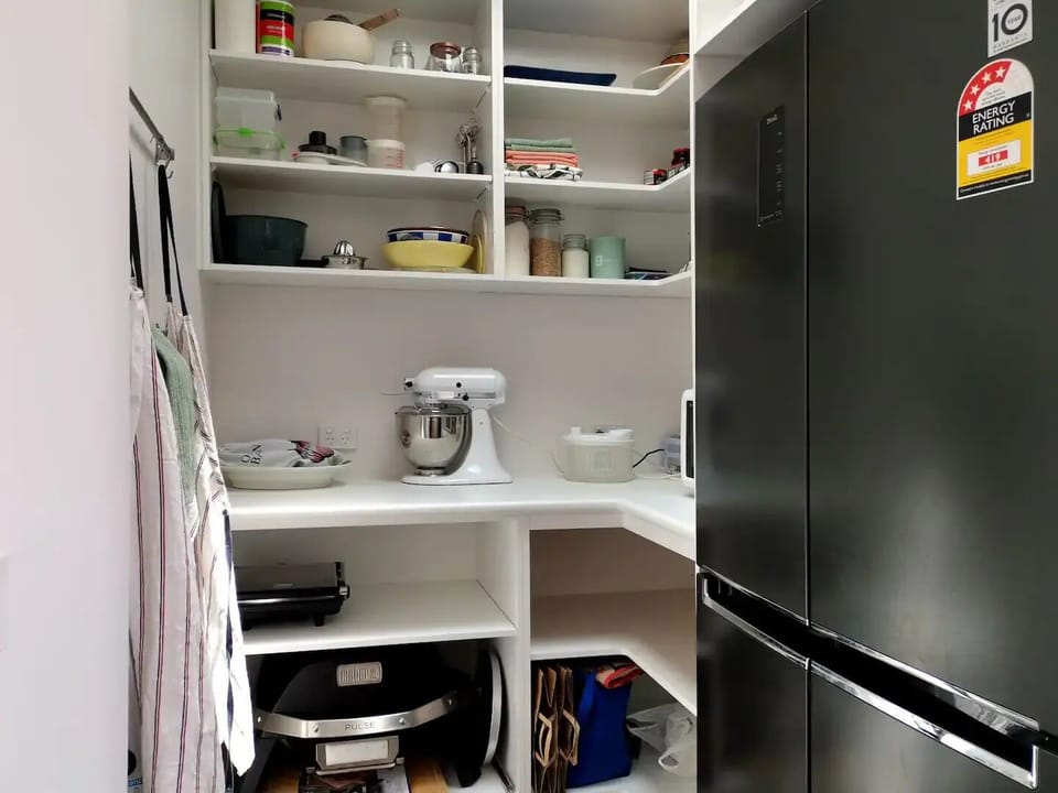 Pantry with Kitchenaid mixer, LG 530L French Door Fridge, microwave.