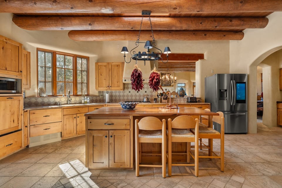 The kitchen island seats four.
