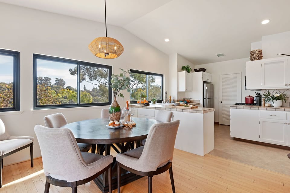 Open kitchen with island bar, perfect for entertaining and serving up your favorite meal!
