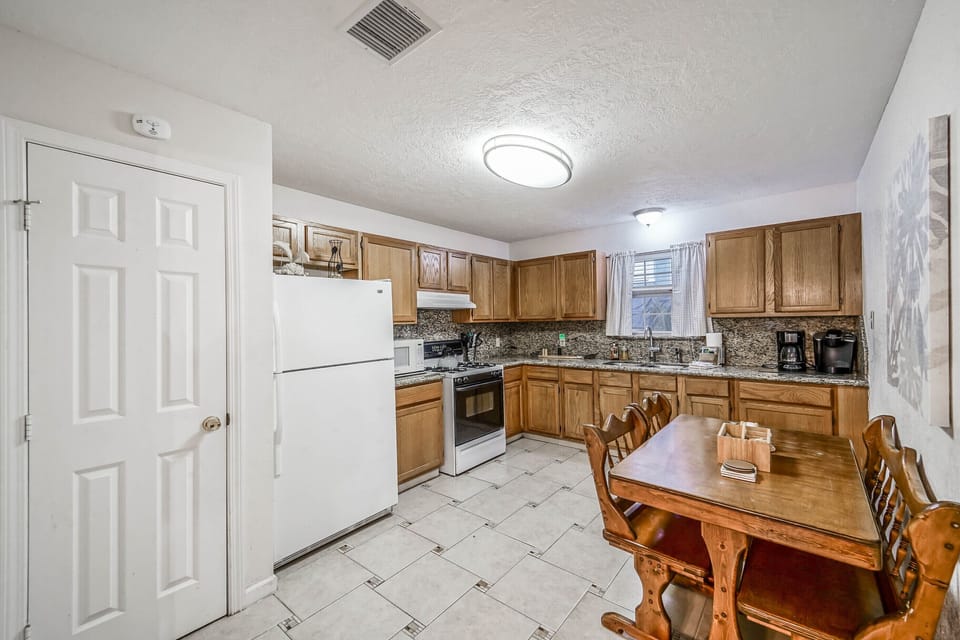 Cute kitchen with a breakfast table.