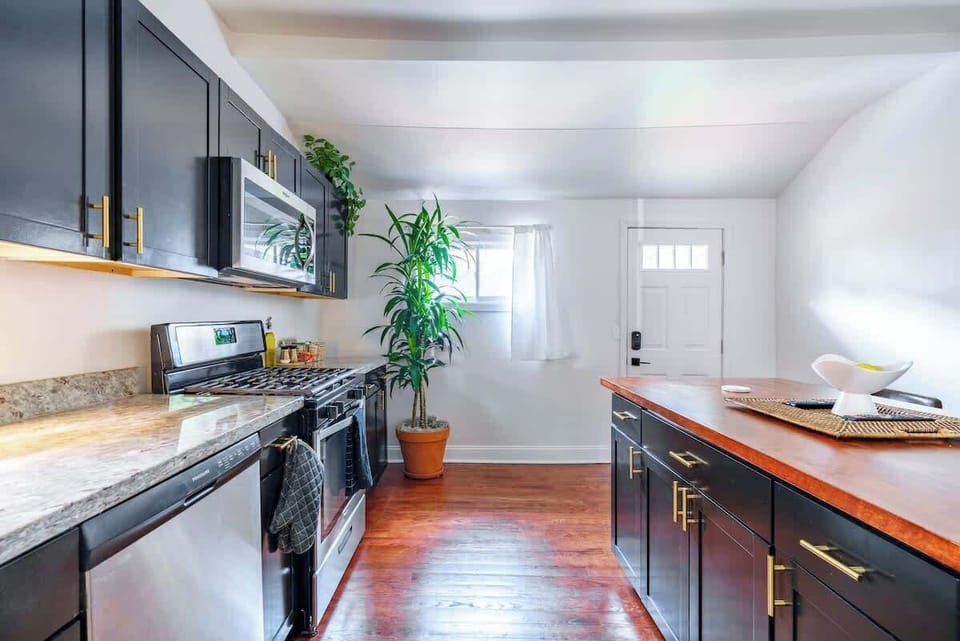 Chef’s Delight: Cook up a storm with our fully equipped kitchen, featuring a Frigidaire refrigerator and stainless steel electric stove, oven, microwave, and dishwasher. With all the cooking basics provided, including pots, pans, and spices, you can 