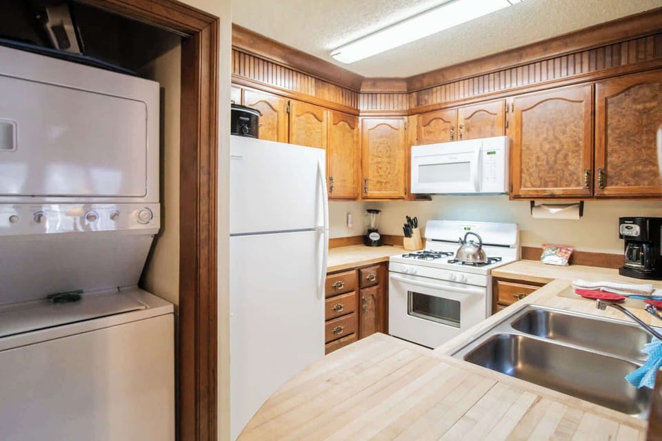 Laundry Room in the condo with Washer and Dryer.