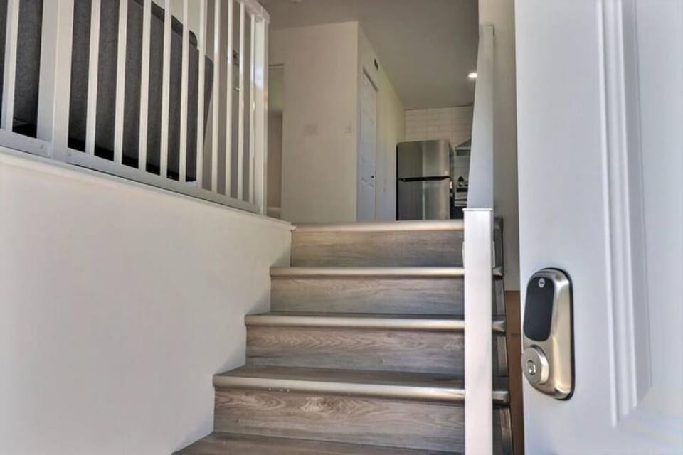 Small staircase leading into the unit.