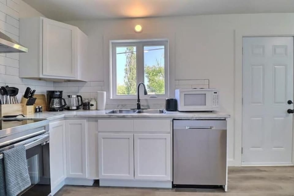 Our kitchen includes brand new stainless steel appliances.