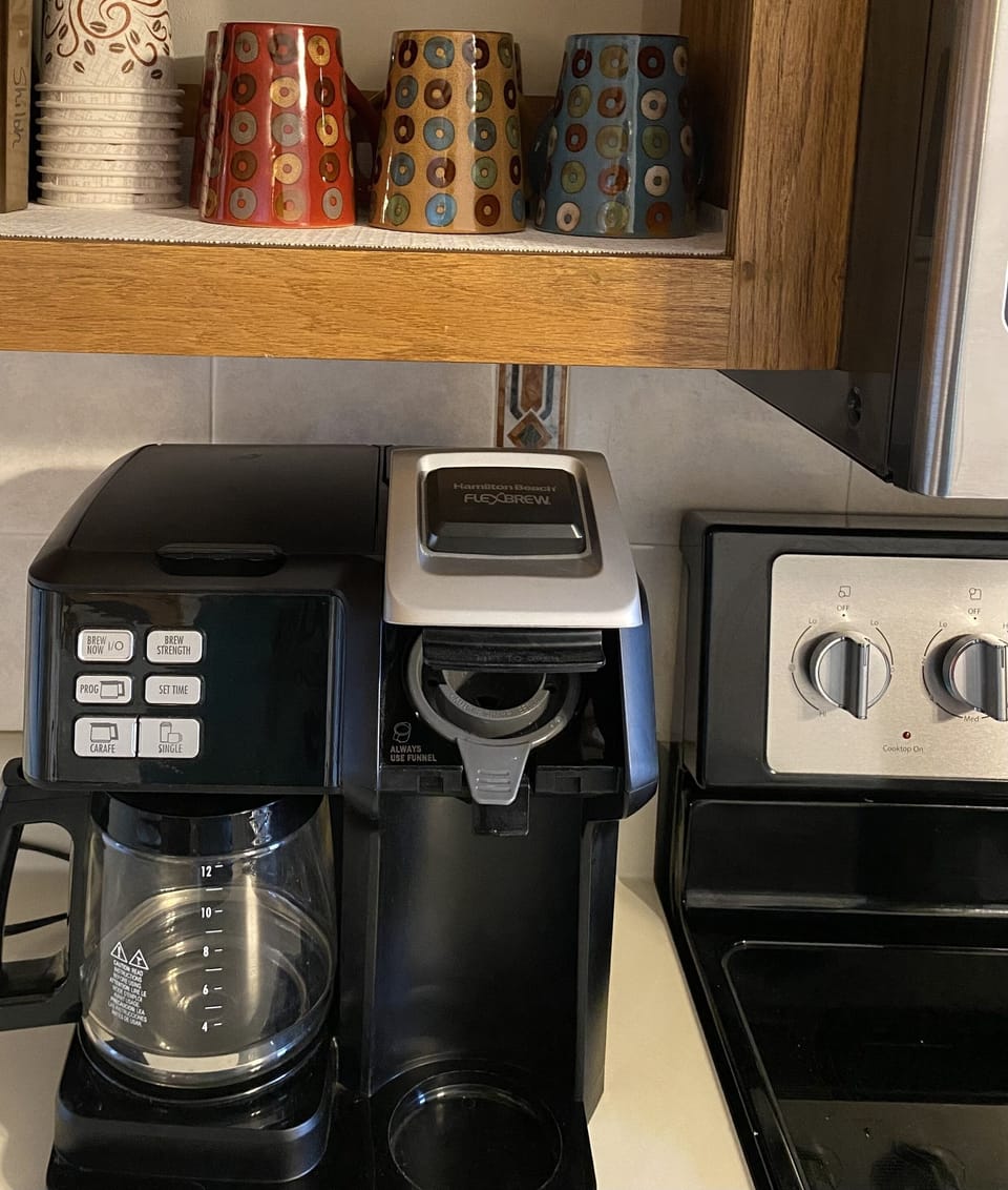 Pods or pot coffee. Pods and Filters provided