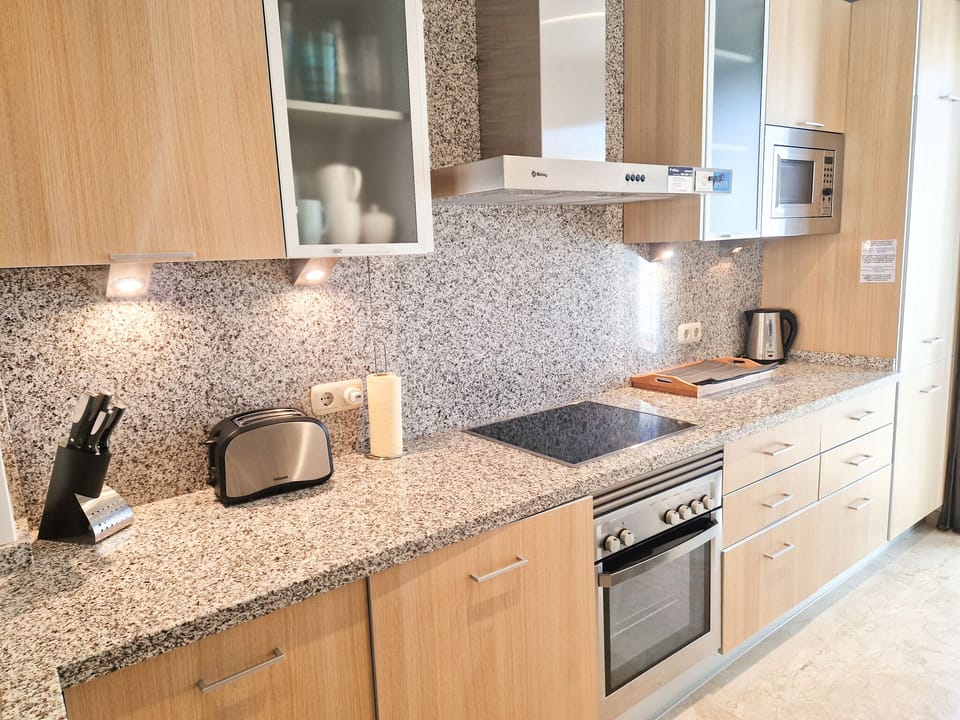 Kitchen with Granite Countertops and High End Appliances (Balay - Spanish Bosch)