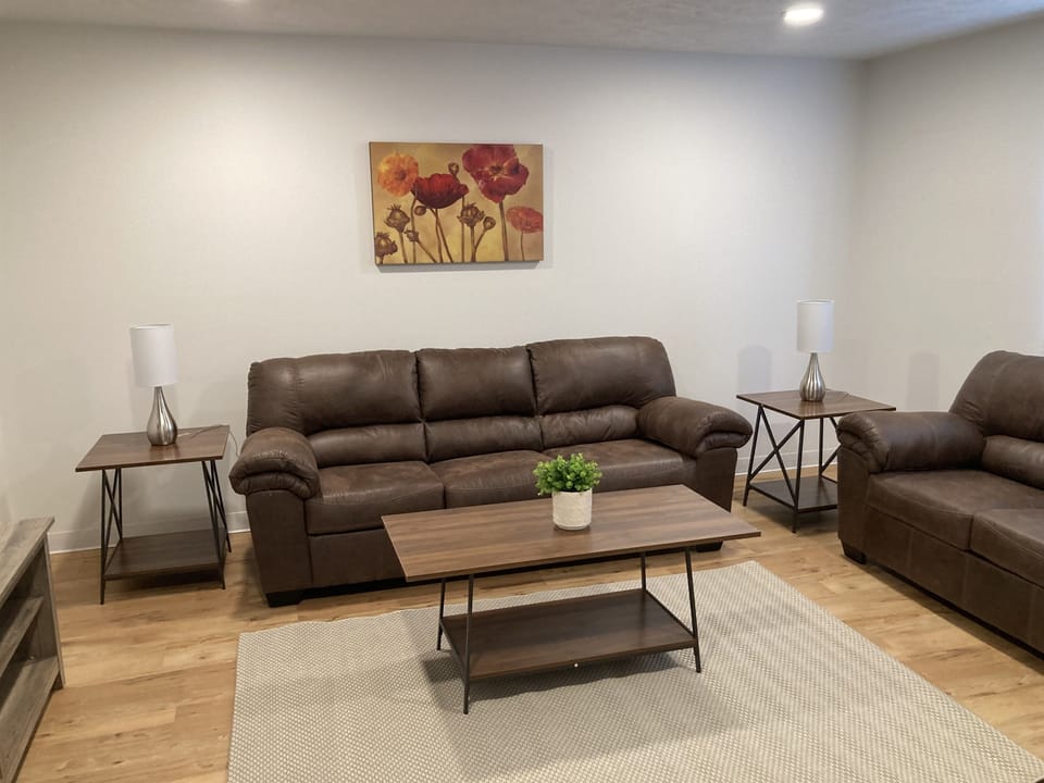 Nice spacious living room with comfy sofas