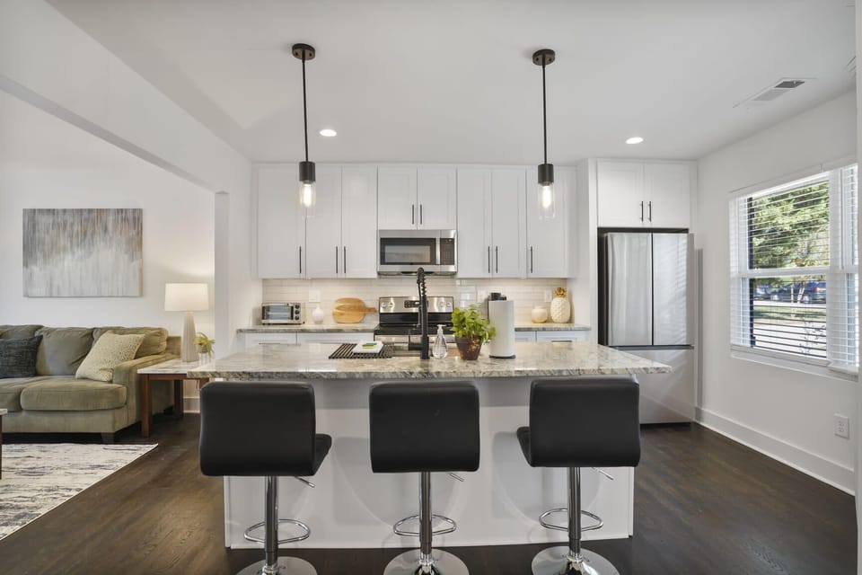 Gorgeous Chef's Kitchen with Built-in Island and Seating
