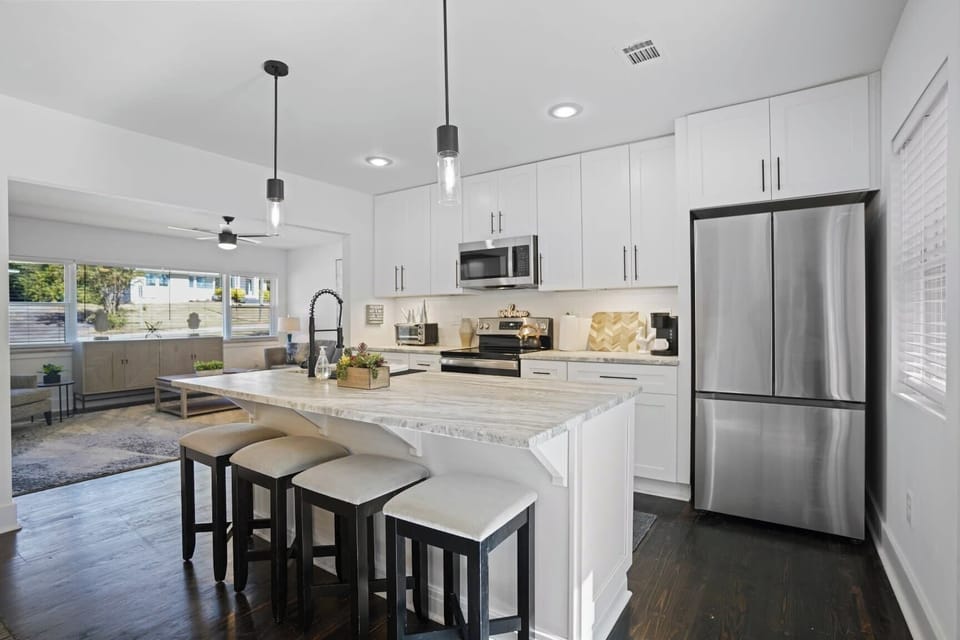 Gorgeous Chef's Kitchen with Built-in Island and Seating