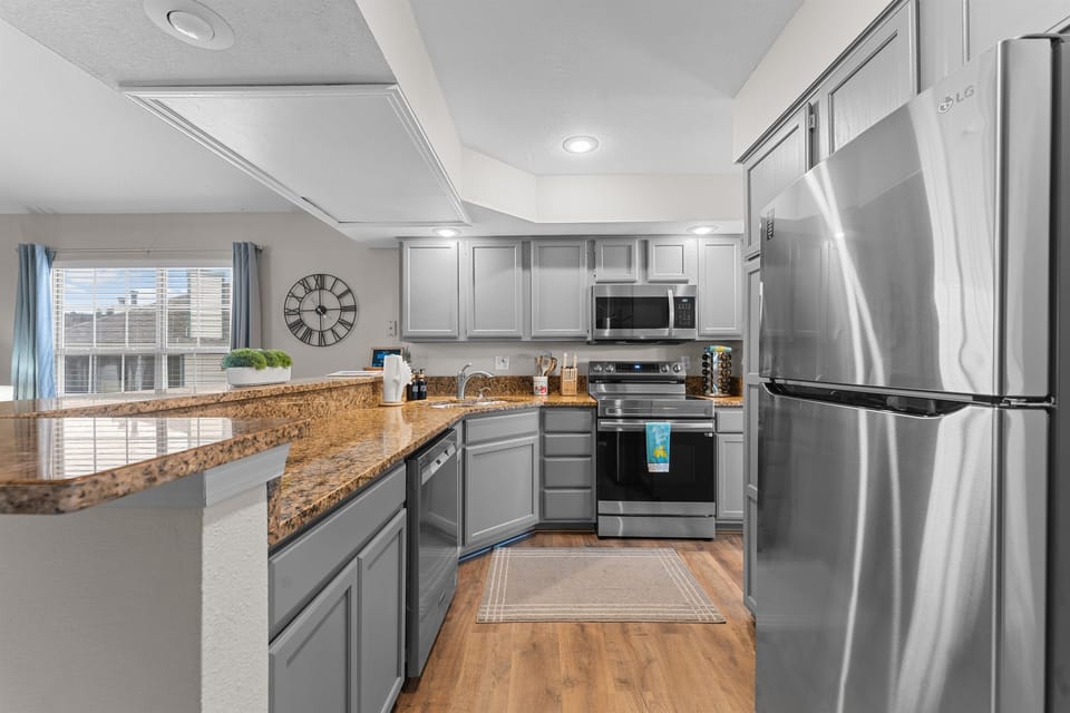 Fully stocked kitchen. Dishes, pots and pans, utensils, blender, toaster, crock pot etc.