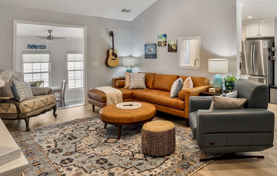 Comfy leather seating; and a guitar for fun