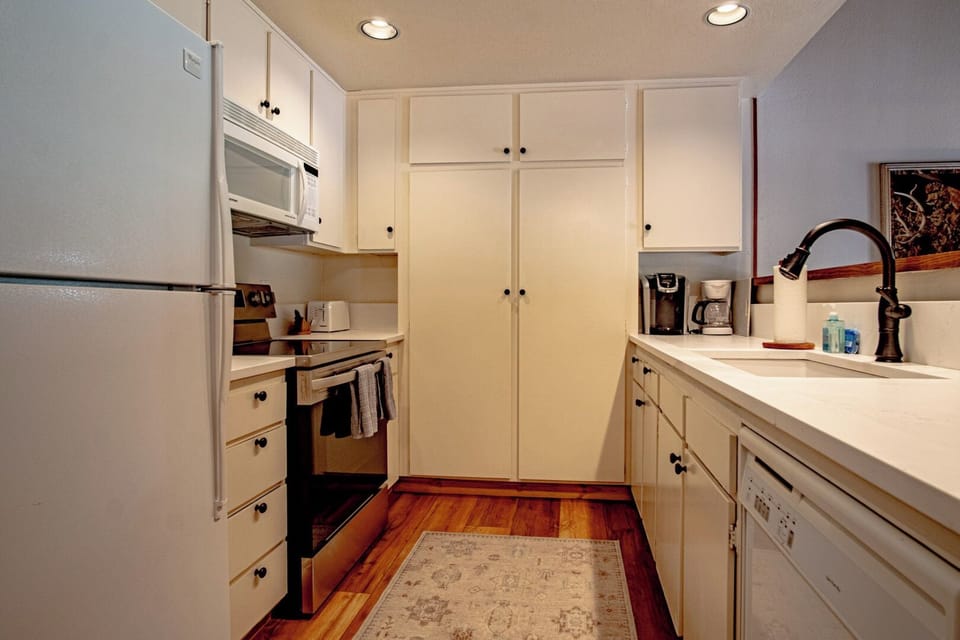 Kitchen opens to living room