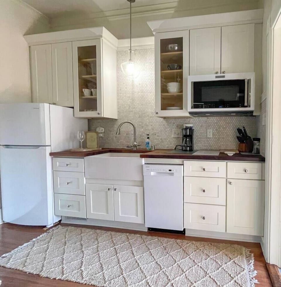 Compact  and efficient kitchen- dishwasher, cooktop and convection oven.