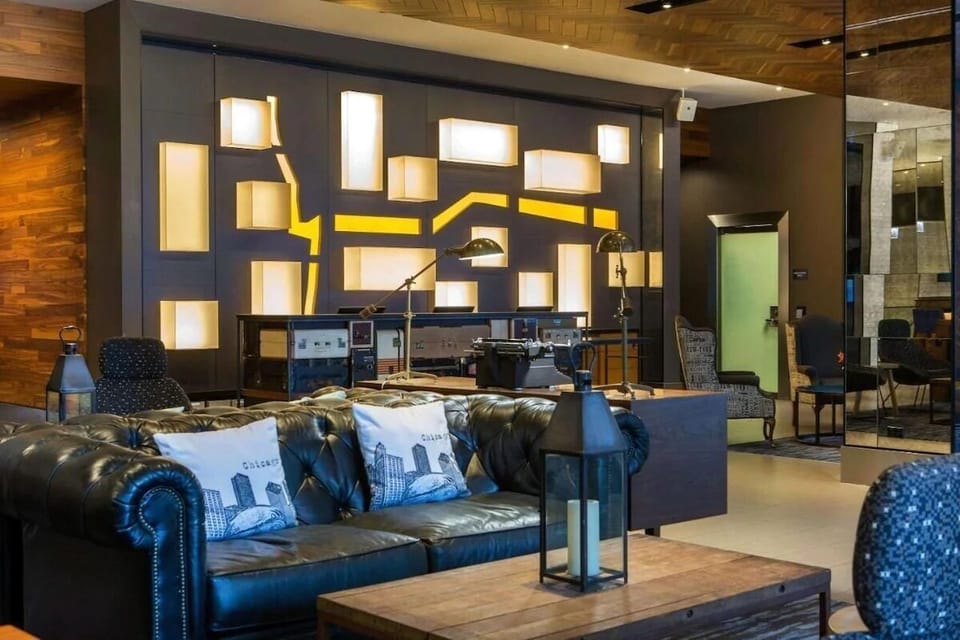 Settle into the cozy lobby lounge with designer lighting.