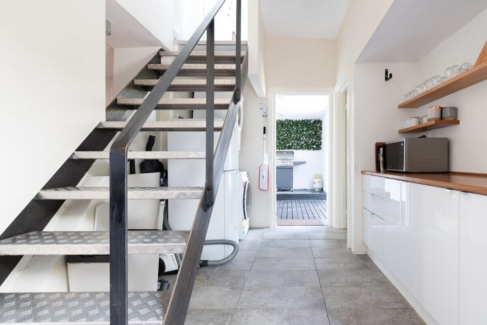 Downstairs kitchen-laundry space
