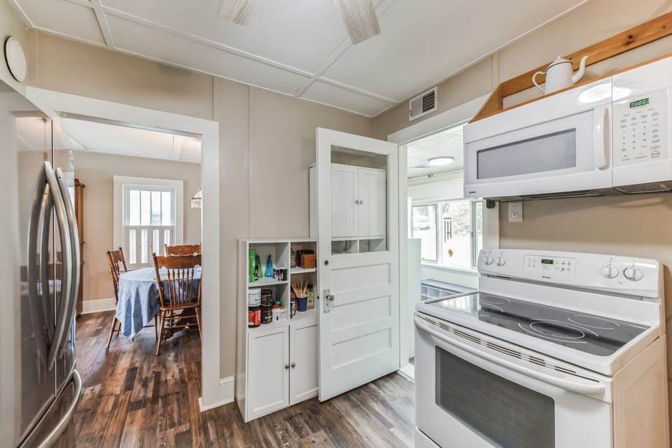 Kitchen leads to Dining Room.  