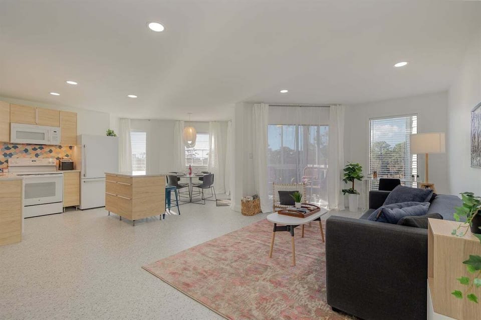 The kitchen and living area are connected so everyone can stay close.