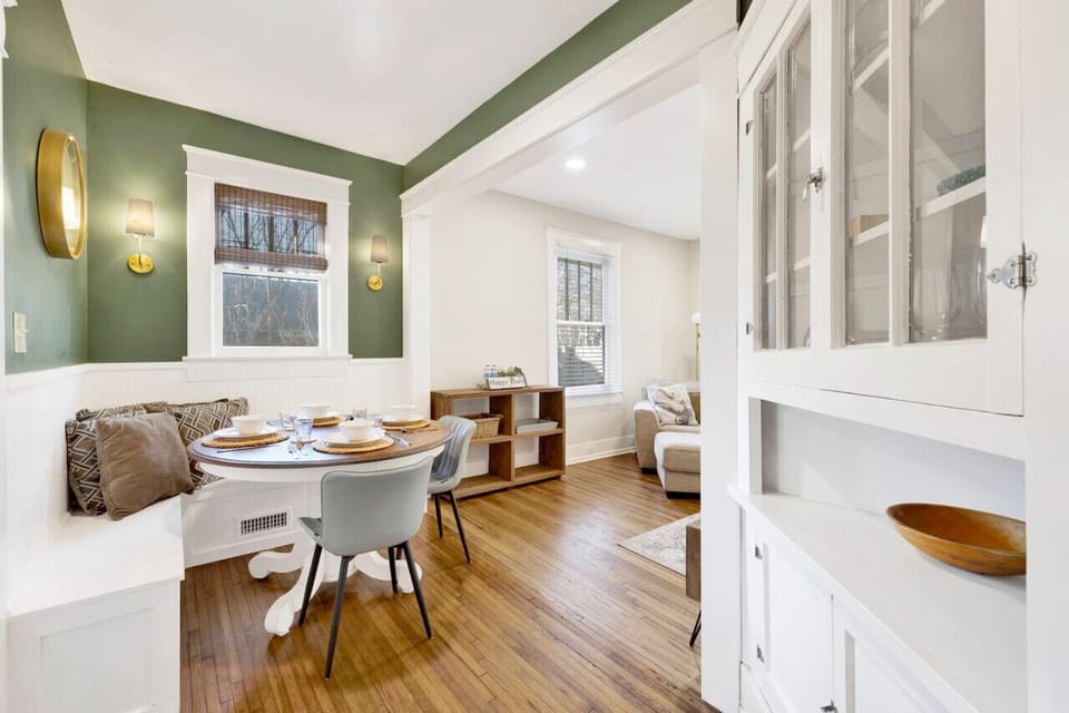 Enjoy your meals in this bright and inviting dining space, perfect for a short-term rental.