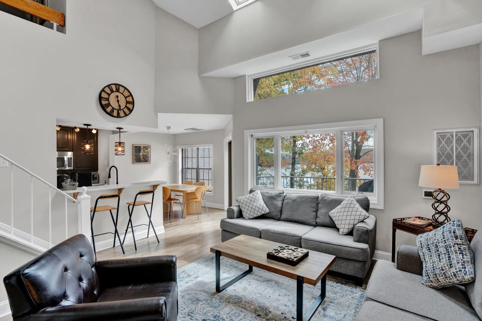 View towards kitchen and dining area from bright and airy living room. Nice view