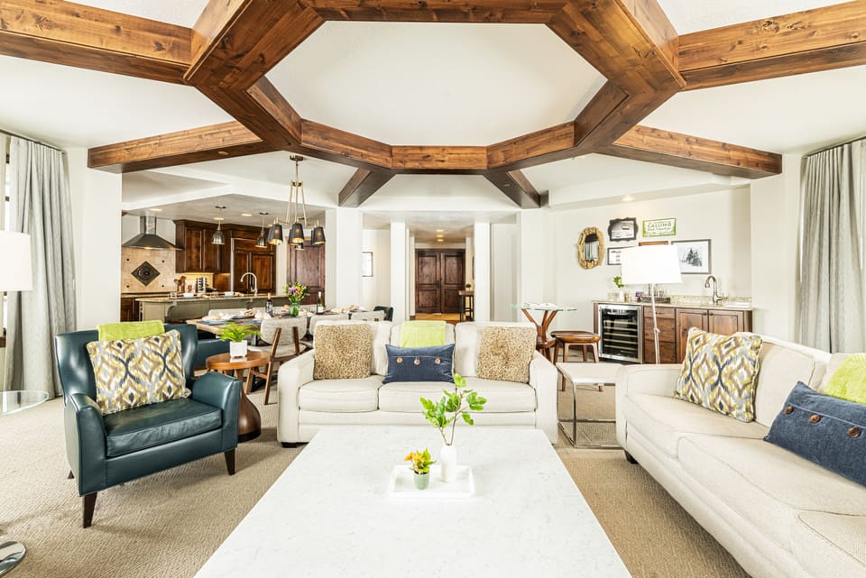 Main living area offering wet bar equipped with a wine fridge
