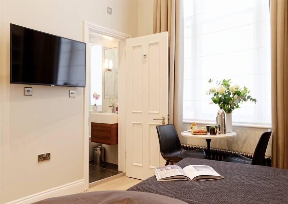 View of the studio and private bathroom entrance.