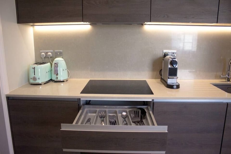 Drawer whit cutlery under the hob.