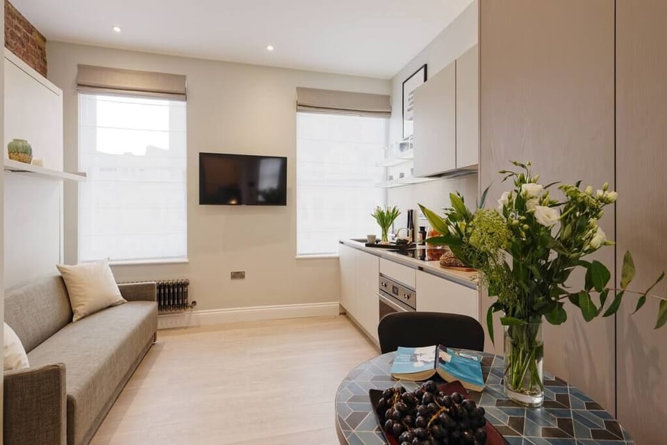 Fully equipped kitchen and living room area.