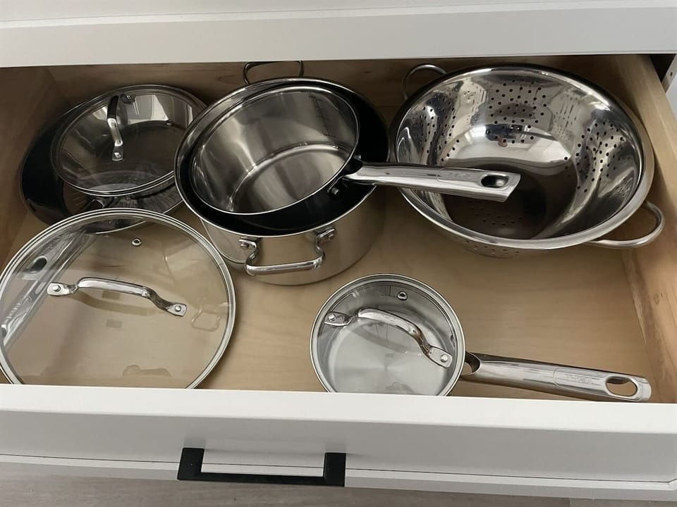 Guests will find a variety of pots, pans, and cooking essentials available for convenient in-home meal preparation.