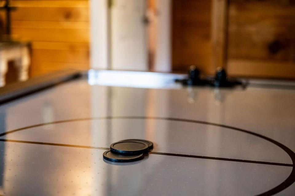 The air hockey table provides hours of fun for your entire group.