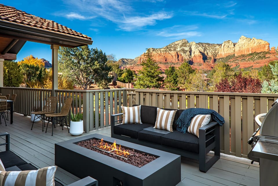 Home 1 cozy outdoor seating with firepit and BBQ
