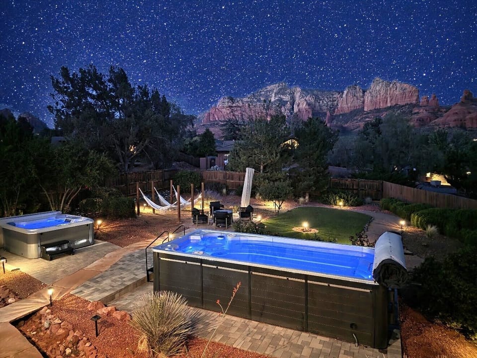Home 1 backyard. Heated pool and tub. Hammocks. Wow Red Rock views!